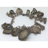 Silver charm bracelet with 15 charms