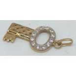 9ct gold stone set key pendant