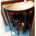 Nest of three mahogany tables and a matching demi lune hall table