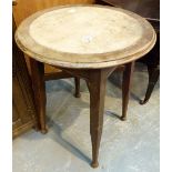 Antique circular table with leather inset top,