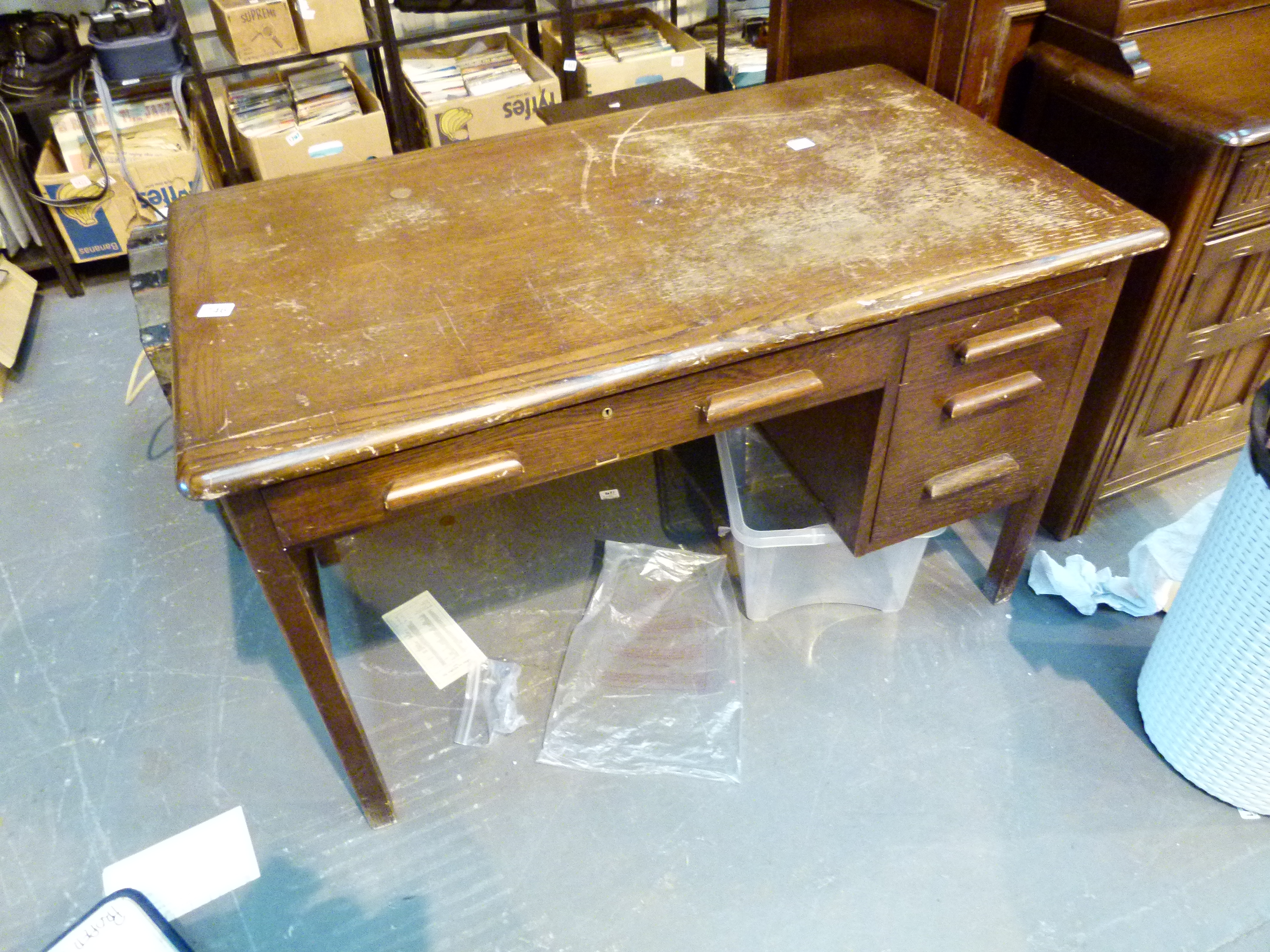 Vintage oak kneehole desk with four drawers,