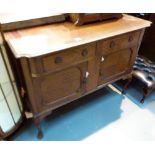 Large mahogany Arts and Crafts style side board with two upper drawers and two under cupboards,