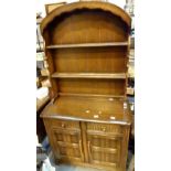 Dark oak Priory style sideboard with two shelf and plate display back