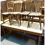 Large pine plank top kitchen table with four dining chairs