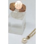 9ct gold chain with pearl pendant and a