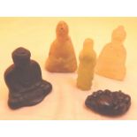 Chinese jade green pendant carved in the form of Buddha seated,