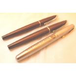 Three fountain pens,