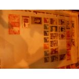 Four sheets of early Communist Chinese stamps