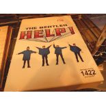 New and unused Beatles 'Help' two disc DVD set and sixty page hardcover book