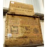 Two wooden advertising boxes,