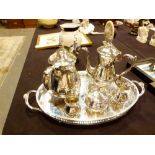 Five piece silver plated tea set on a tray