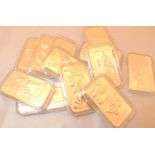 Set of twelve white metal star sign ingots