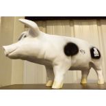 Black and white garden pig statue,