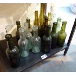 Shelf of antique glass bottlews