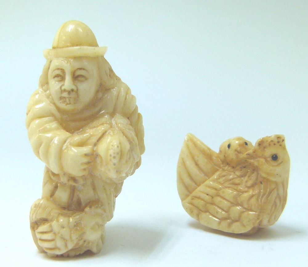 Two Oriental bone ojime