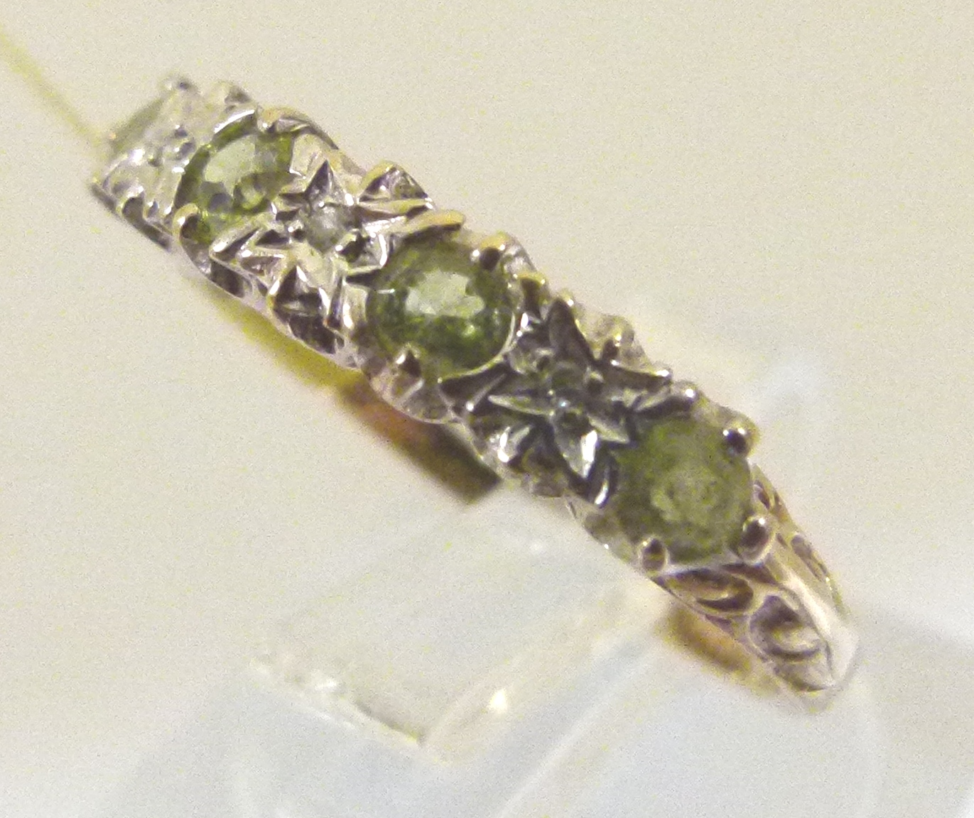 9ct gold peridot and diamond half eternity ring,