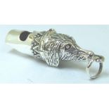 Silver stamped dogs head whistle