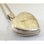 Silver heart locket on silver chain