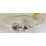 Sterling silver genuine Pandora bangle with a genuine Pandora silver and gold charm,