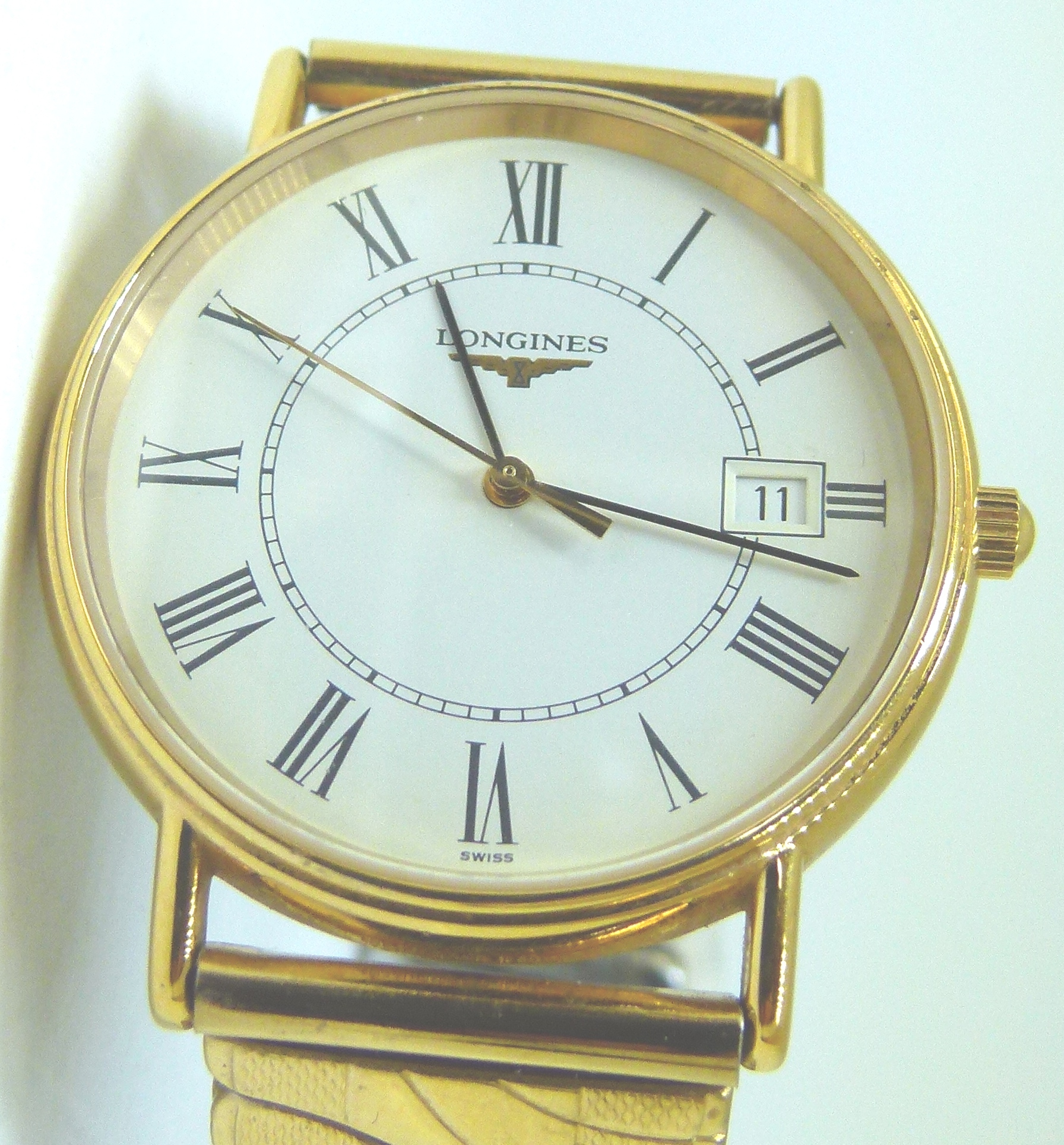 Gents Longines gold plated wristwatch on stretch gold plated bracelet CONDITION REPORT: