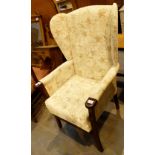 Upholstered mahogany armchair