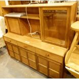 Nathan living room unit with three drawers over three cupboards,