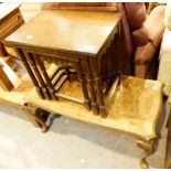 Oak nest of tables and a walnut coffee table