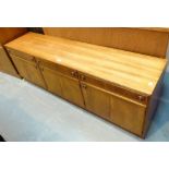 Low mahogany sideboard with three drawer