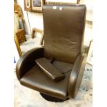 Brown leather swivel armchair