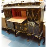 Ebonised Oriental secretaire with twin g