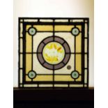 Stained glass panel with central painted floral motif 46 x 46 cm