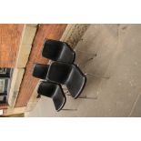 Early 21st Century steel and faux leather folding chairs (4 items)