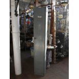 Mid Century steel industrial locker coated in grey, with internal high shelf and hook.
