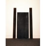 Two cast iron reeded fireplace side lining panels H: 107 W: 9 cm