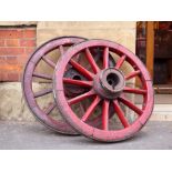 Antique wood and cast iron red wagon wheel