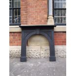 Victorian cast iron fire surround with simple leaf detail and arched opening H: 110 W: 116 cm