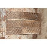 A quantity of nine Victorian cast iron floor grills in a diamond hatch pattern L: 145 W: 28