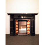 Fine slate fire surround with corbel bracketed shelf H: 111 W: 157 cm