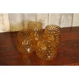 4 Mid Century amber glass lampshades with dimpled design H: 16 cm