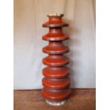 Curvaceous ceramic insulator H: 136 cm