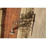 Victorian wrought iron light bracket with floral design
