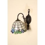 A Tiffany style leaded glass wall mounted light,