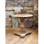 Antique circular oak occasional table on single pedestal base