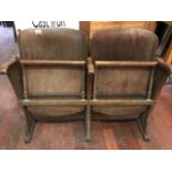 A pair of early 20thC beech and plywood cinema seats H: 80 W: 105 cm