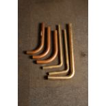 6 assorted brass and copper flush pipes