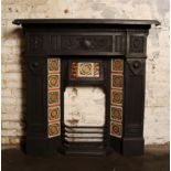 Victorian cast iron tiled combination fireplace with brown and green tiles 124 x 124 cm