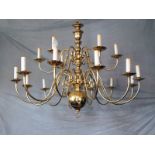 Victorian brass 18 arm chandelier with candle tubes simple swirl arms and a large lower brass bowl