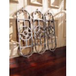 Thirty five cast iron balustrades of Art Deco design H: 86 W: 24 cm