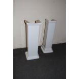 A pair of Art Deco style porcelain pedestals