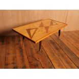1960's oak original 'Heals' rocket coffee table with walnut geometric designed marquetry H: 44 L: